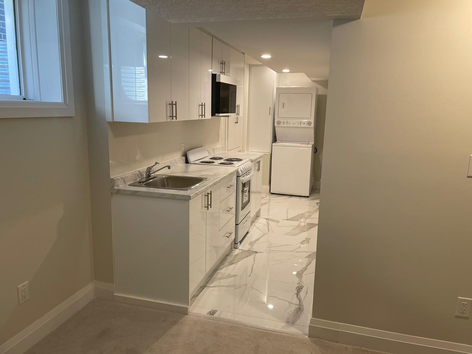 Custom kitchen cabinetry and accessories in a compact Toronto space